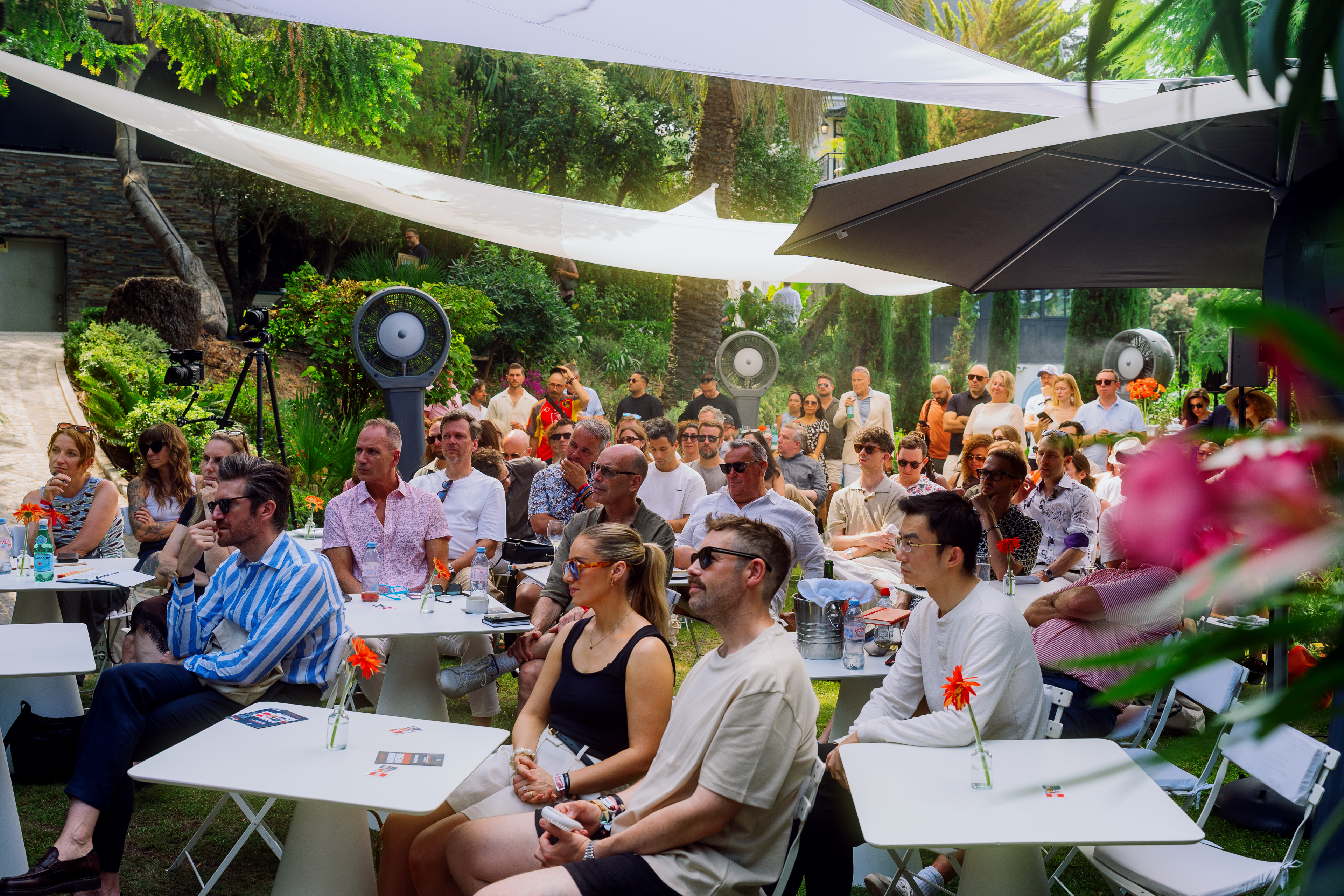 Garden reception under sail shades at COLLINS House